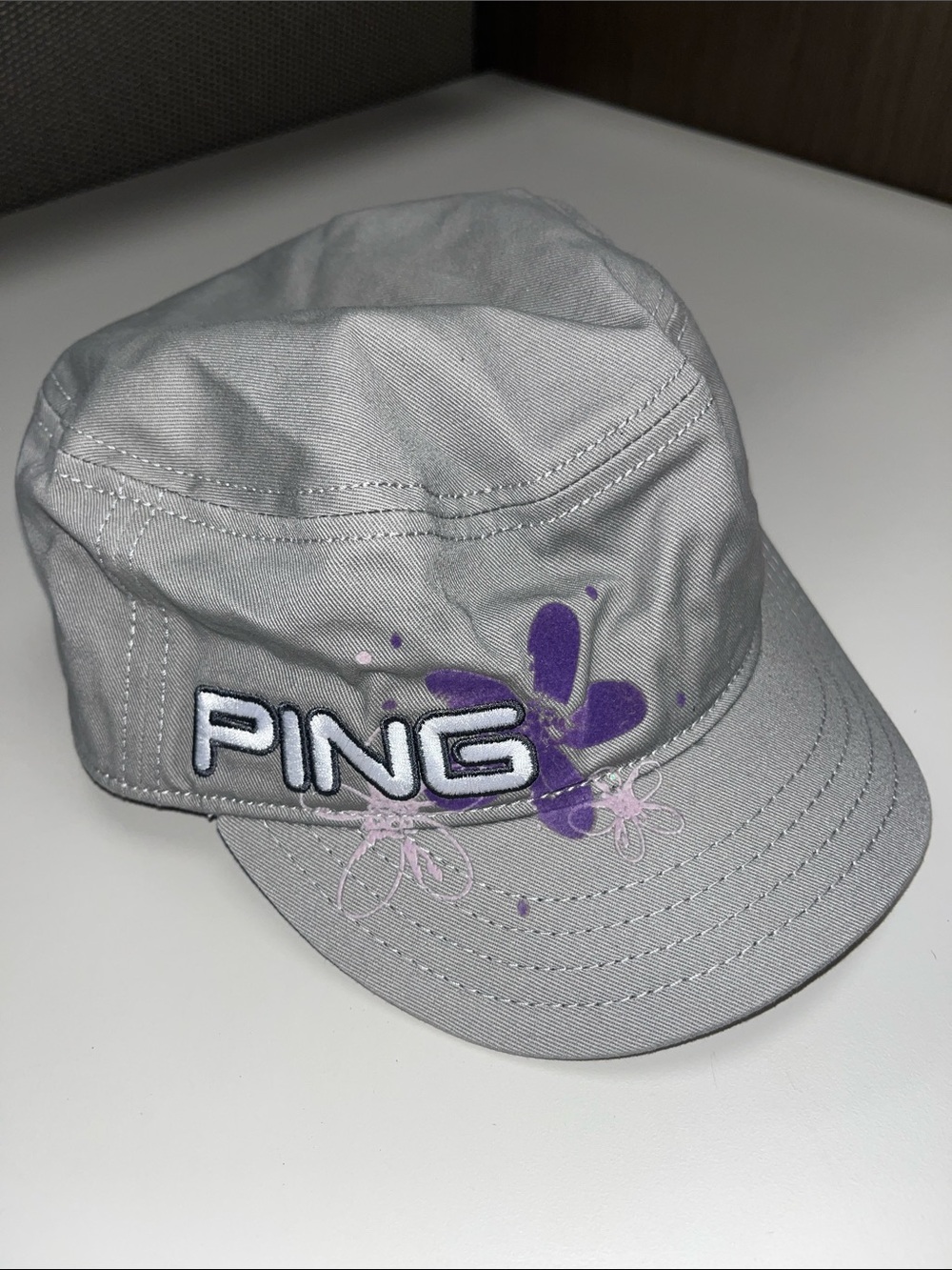 PING Light Gray Hat with Purple and Pink Floral Design